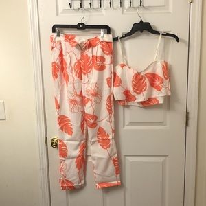 Orange two piece outfit. Crop top with pants